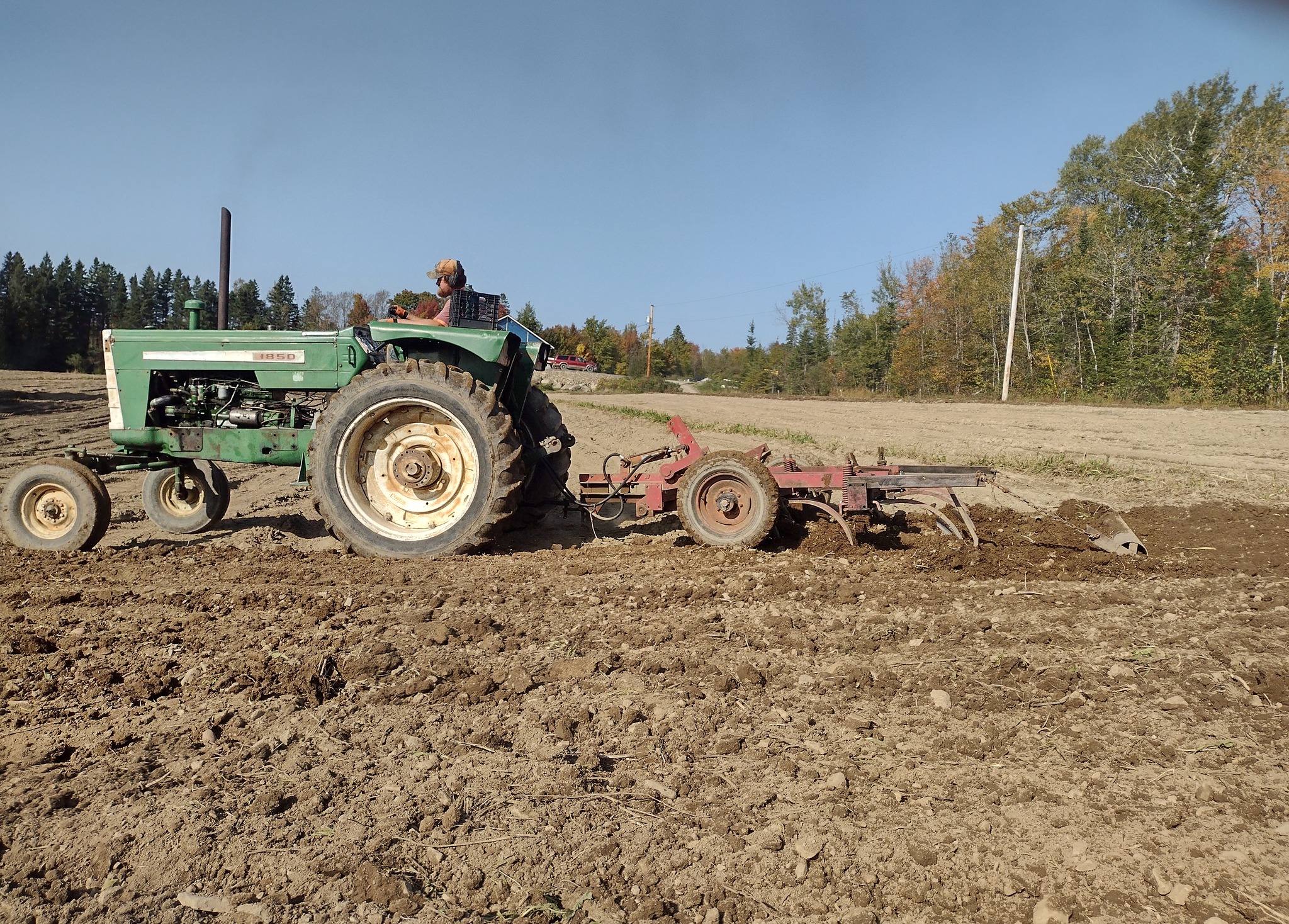 Person on tractor with equipment